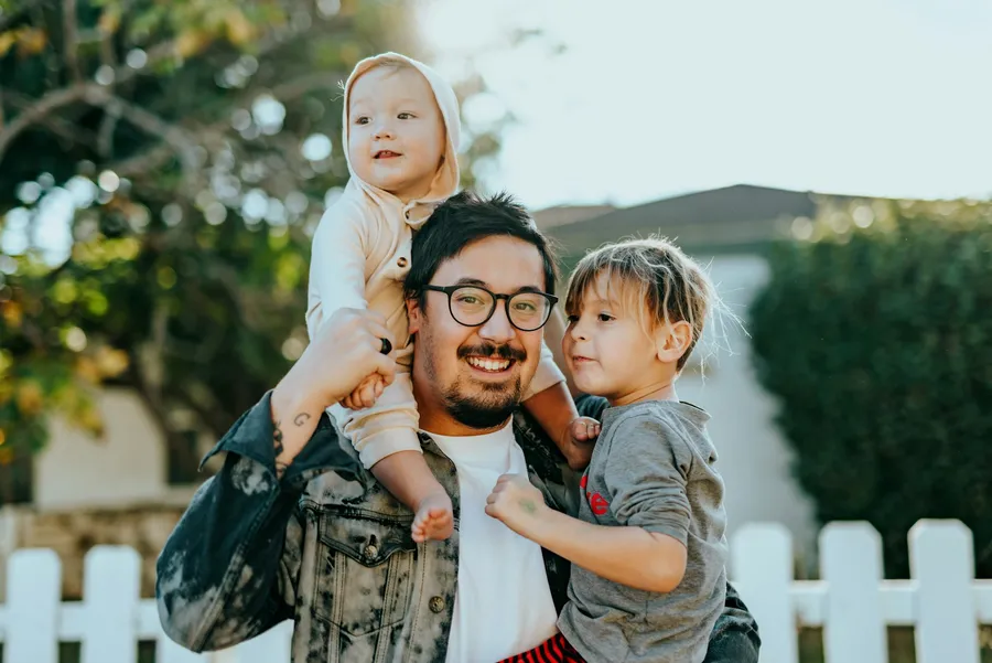 A father spending time outdoors with his children